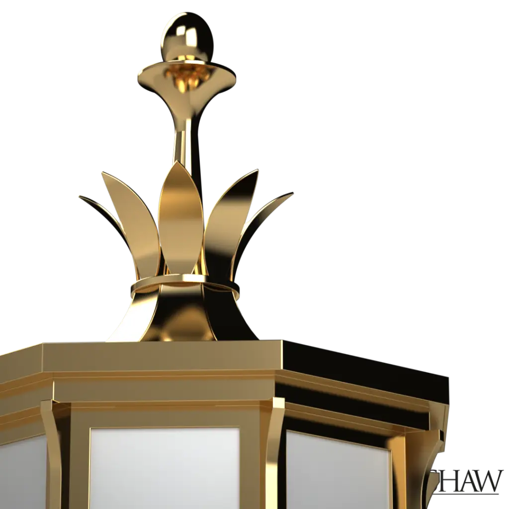 Decorative wall-mounted light fixture with gold and glass design on a white background