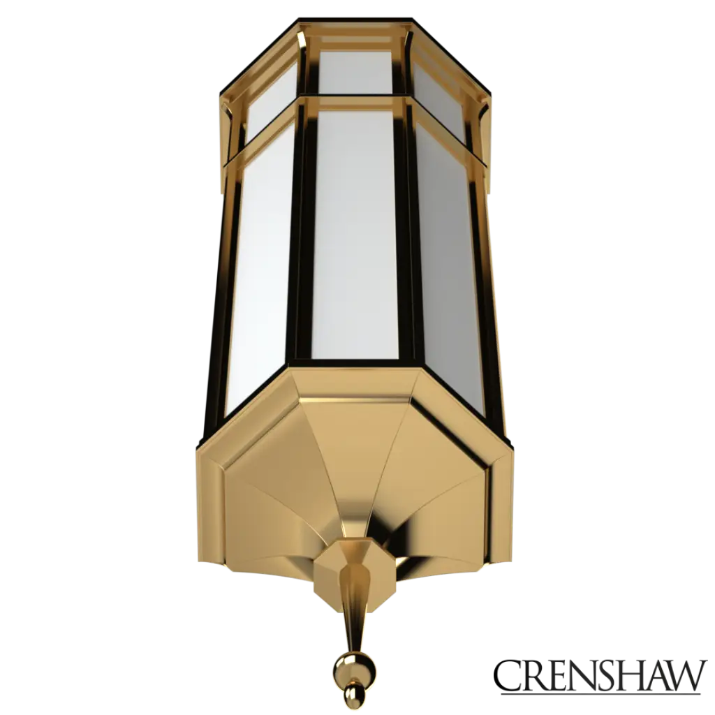 Decorative wall sconce with gold finish and glass panels on a white background