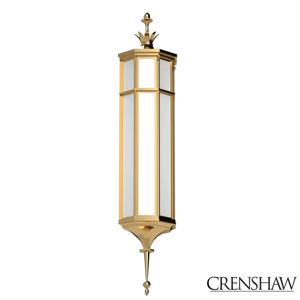Decorative wall lantern with gold finish and glass panels on a white background