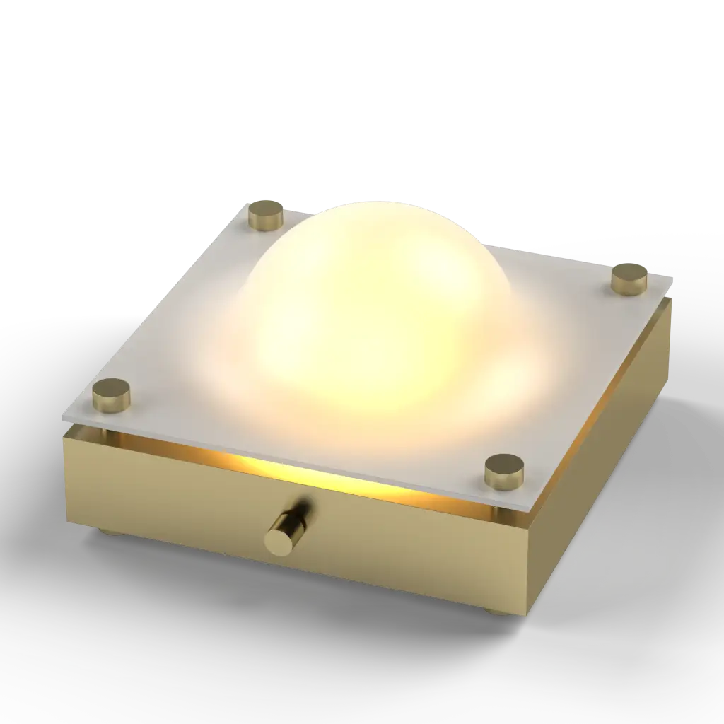 Square light fixture with a glass cover and gold accents on a white background