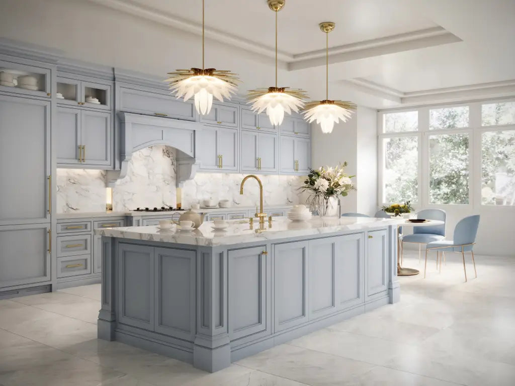 Modern kitchen with gray cabinets, marble island, and pendant lights.