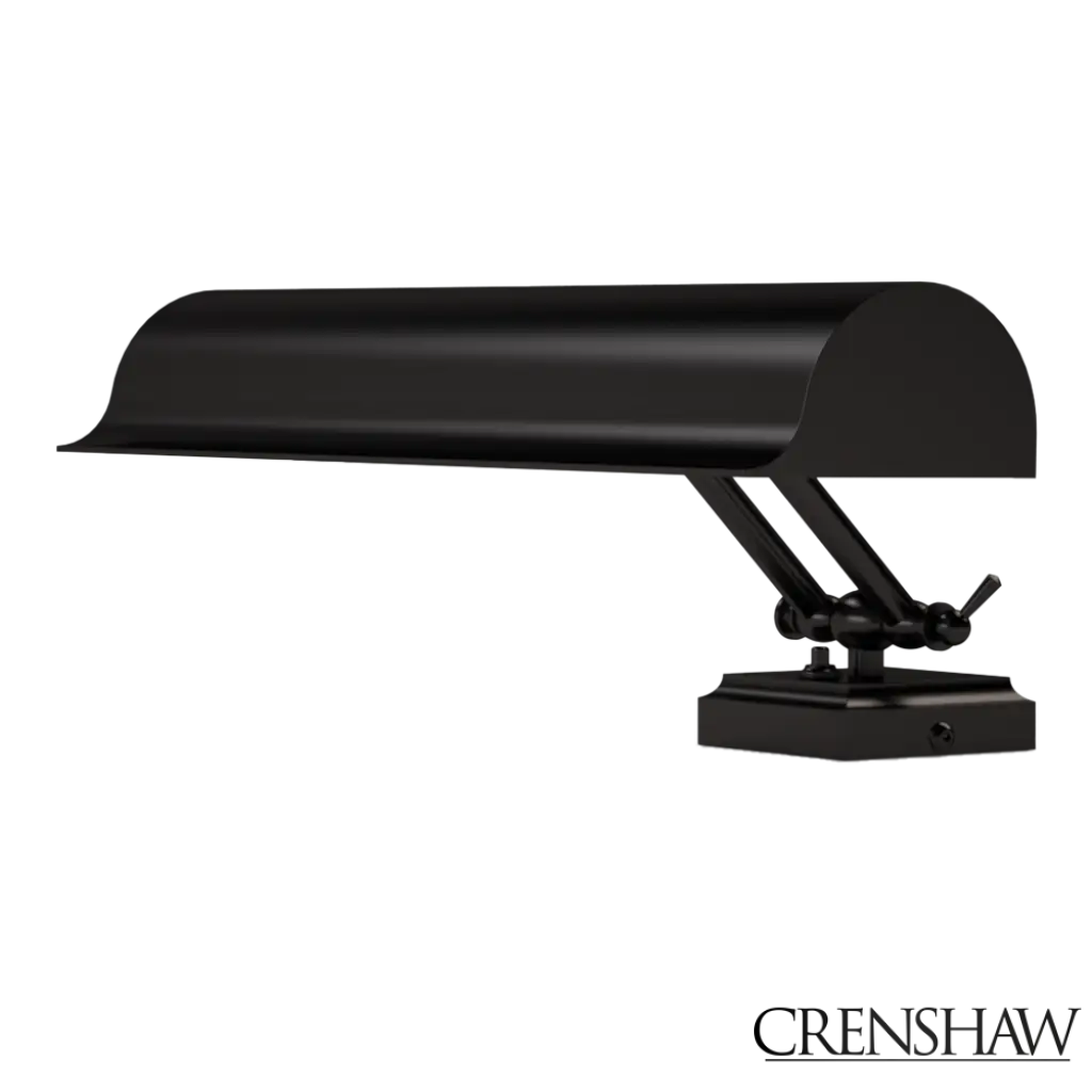 Black piano lamp on a white background