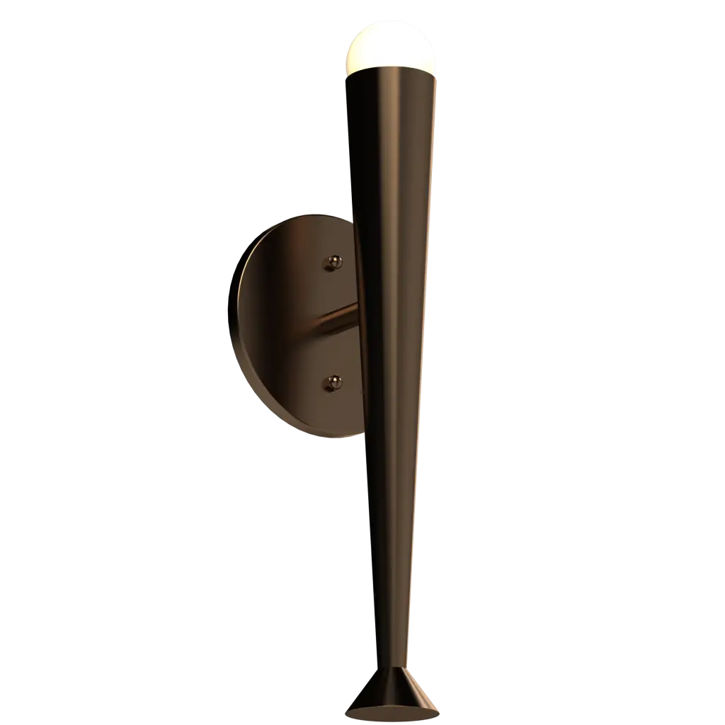 A conical wall sconce with a glowing white bulb.
