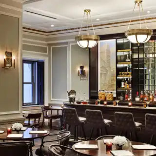 A sophisticated bar area with ornate lighting.