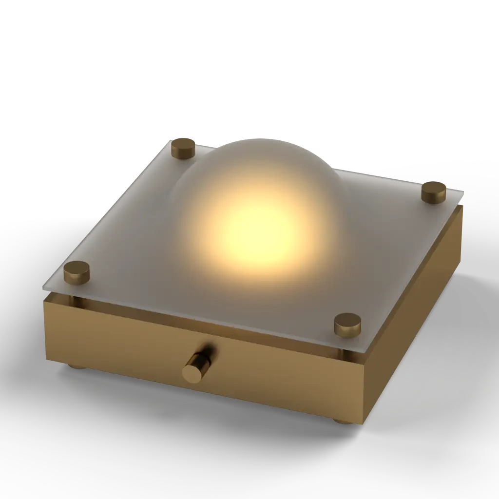 Decorative lamp with a metallic base and glass shade on a white background
